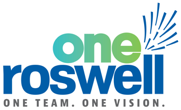 A logo with blue and green letters

Description automatically generated
